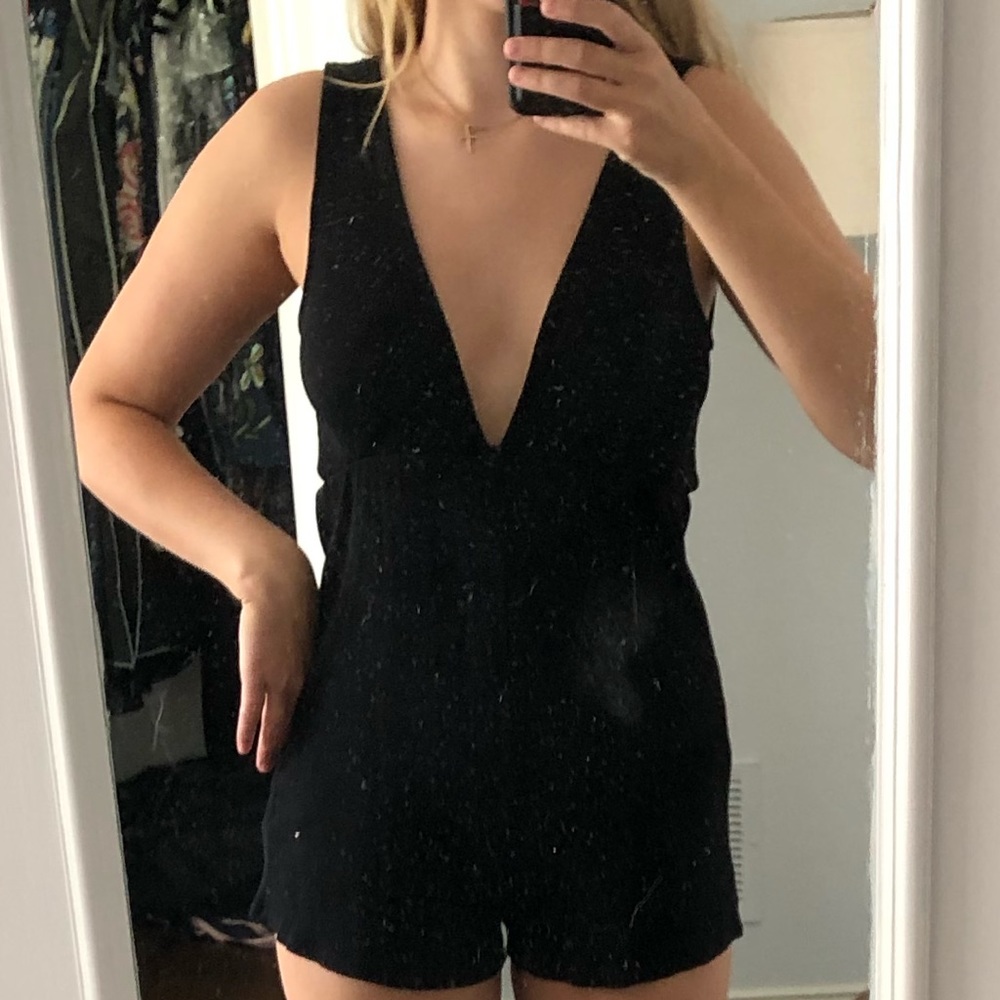 Urban Outfitters ripped deep V neck romper